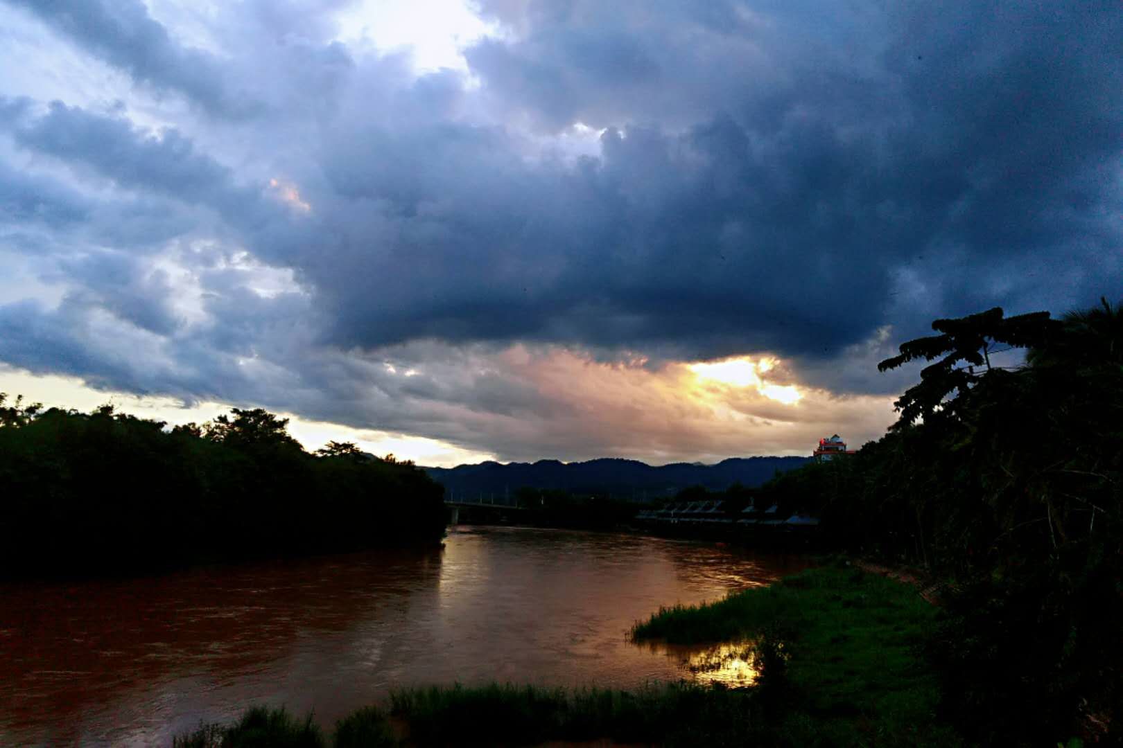 The Luosuo River surrounding XTBG in the sunset